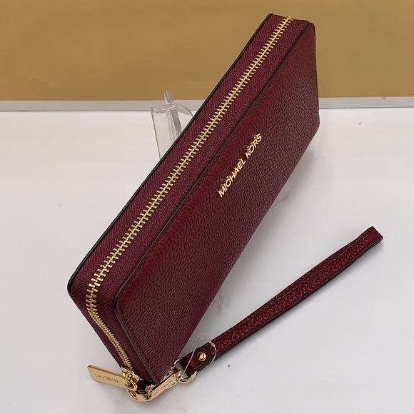 MICHAEL KORS
Leather Continental Wristlet Phone Case Wallet
Oxblood
NWT - Picture 11 of 16